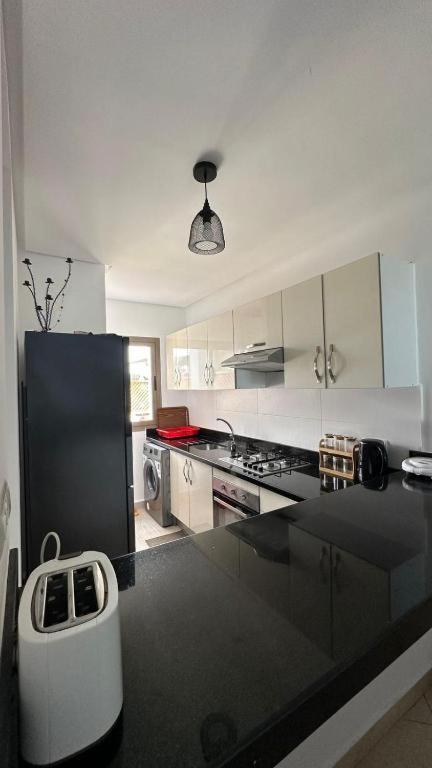 Appartement Pied Dans L Eau A Residence Beralmar Asilah Buitenkant foto